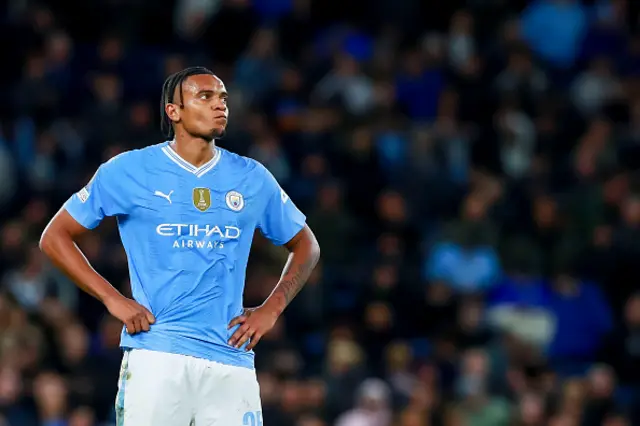 Manuel Akanji of Manchester City looks on