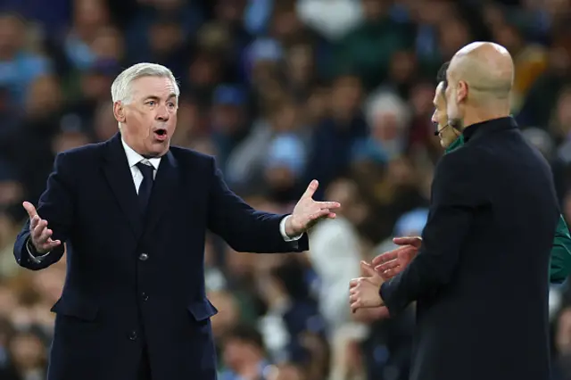 Real Madrid Manager Carlo Ancelotti reacts to Manchester City Manager Josep Guardiola