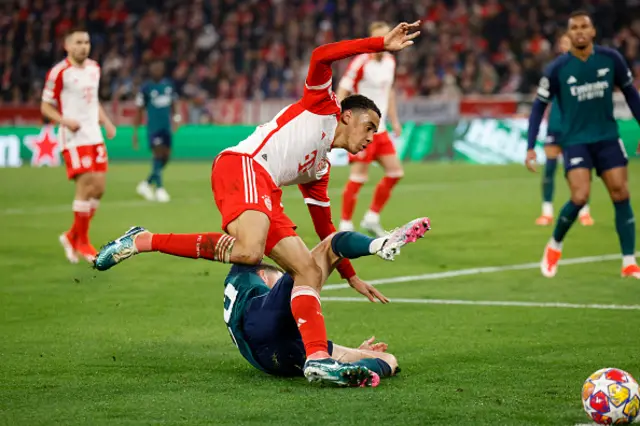 Jamal Musiala and Arsenal's Italian midfielder Jorginho vie for the ball