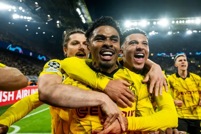 Ian Maatsen and Jadon Sancho celebrate