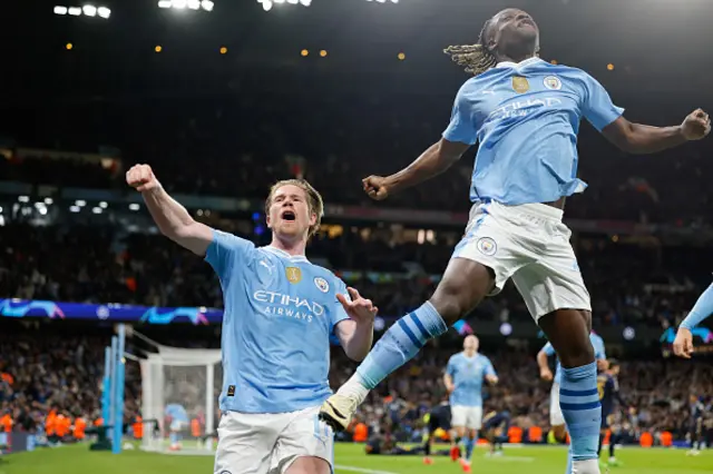 Kevin De Bruyne of Manchester City celebrates with Jeremy Doku