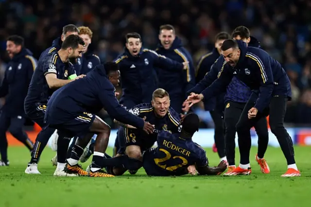 Antonio Rudiger celebrates with teammates