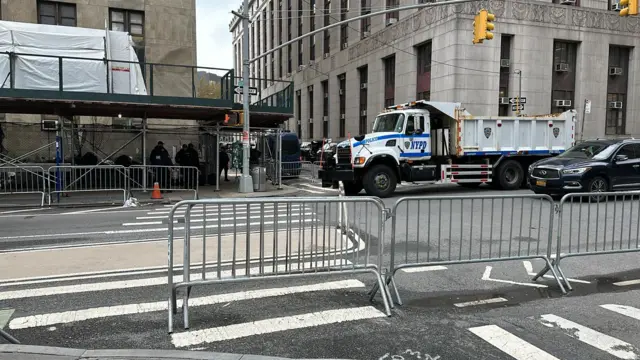 A truck block off a street outside court