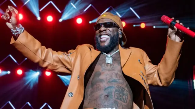 Burna Boy performs onstage during Day 1 of the Afro Nation Detroit Festival on August 19, 2023 in Detroit, Michigan