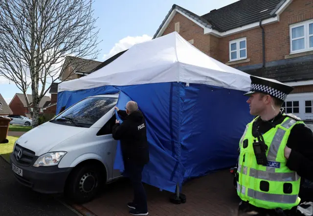 Police outside Mr Murrell's home that he shared with Nicola Sturgeon in April 2023