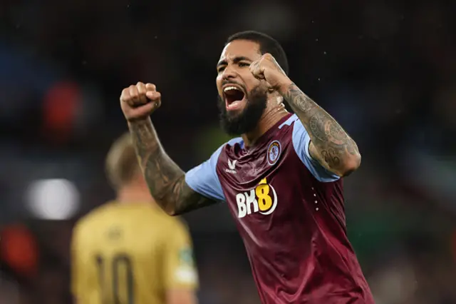 Douglas Luiz of Aston Villa celebrates a victory