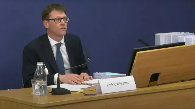 Rodric Williams giving evidence, he has notes in front of him