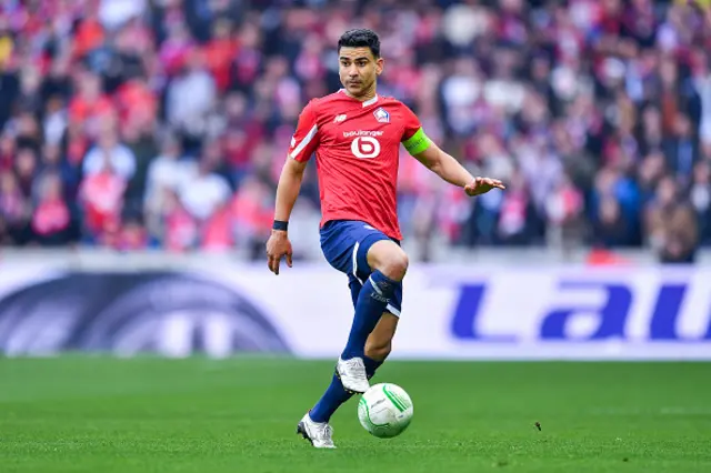 Benjamin Andre of Lille OSC runs with the ball