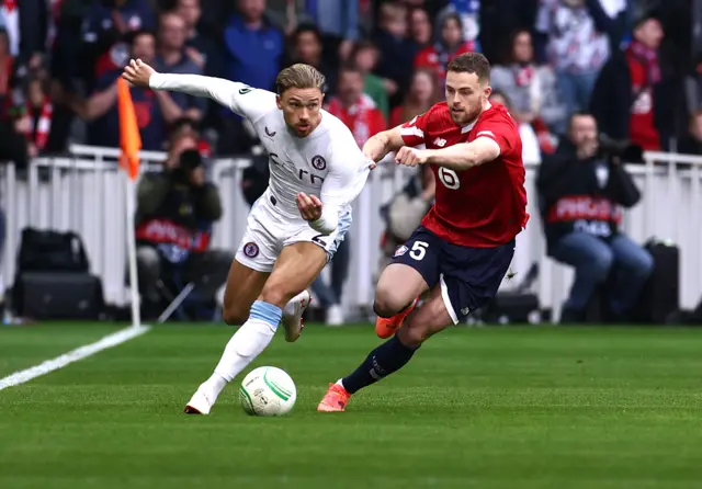 Aston Villa's Matty Cash in action with Lille's Gabriel Gudmundsson