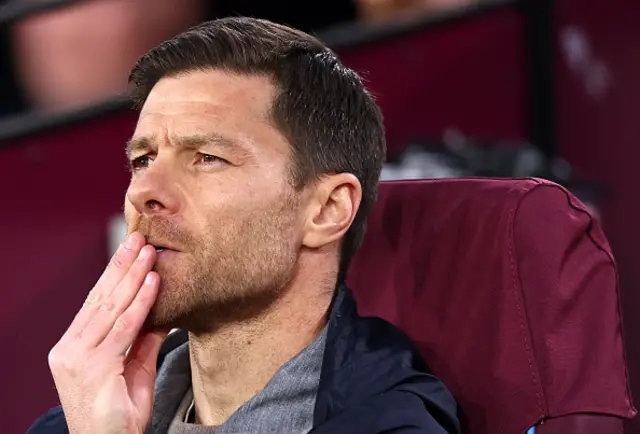 Xabi Alonso, Manager of Bayer Leverkusen looks on