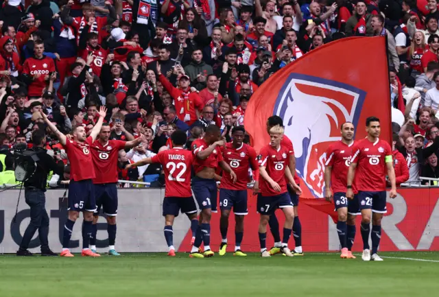 Lille's Yusuf Yazici celebrates scoring their first goal with teammates