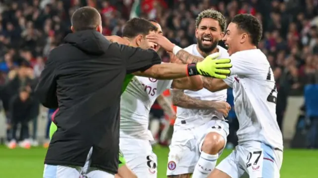 Aston Villa players celebrate