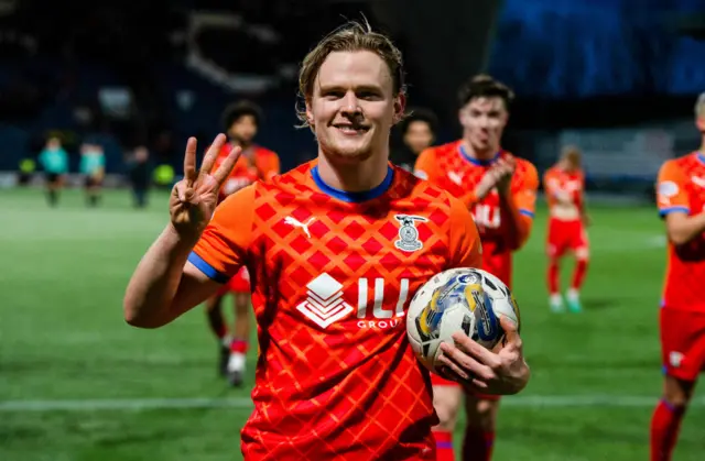 Inverness' Alex Samuel posed-up with the match-ball after a cinch Championship match between Raith Rovers and Inverness Caledonian Thistle at Starks Park, on January 27, 2024, in Kirkcaldy, Scotland.