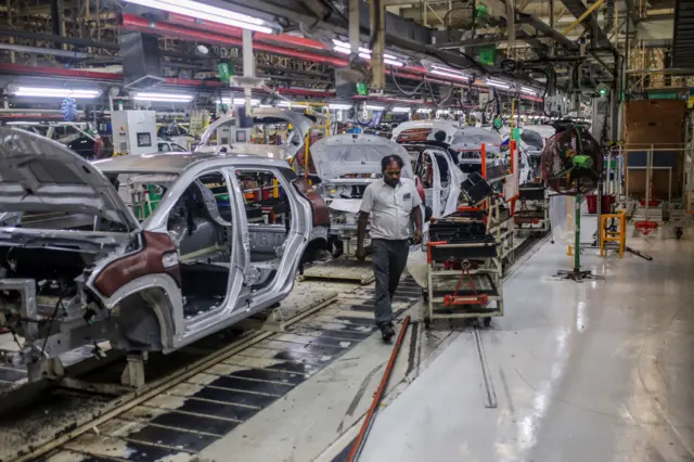 A worker on the production line at the Renault Nissan Automotive India Pvt. manufacturing plant in Chennai, India, on Wednesday, March 27, 2024. Renault SA is selling a second tranche of its remaining stake in Japanese partner Nissan Motor Co., which may help the French carmaker return to an investment grade rating. Photographer