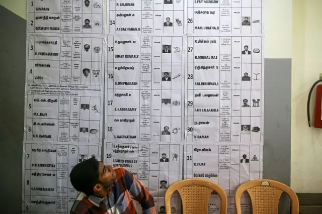 Candidate's information displayed at a polling station during the first phase of voting for national elections in Chennai