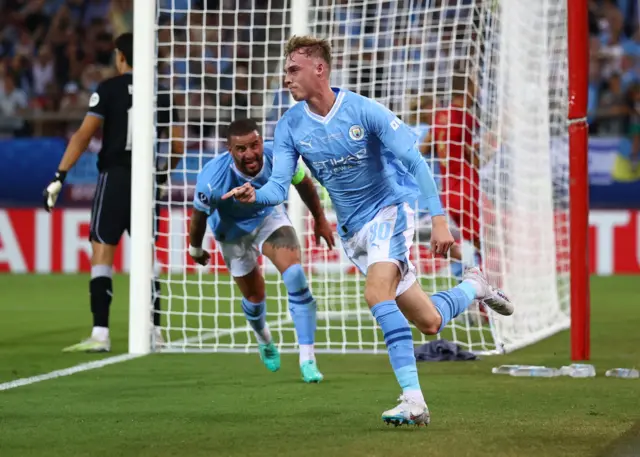 Cole Palmer celebrates scoring for Manchester City