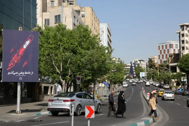 Residents and commuters in Tehran on 19 April