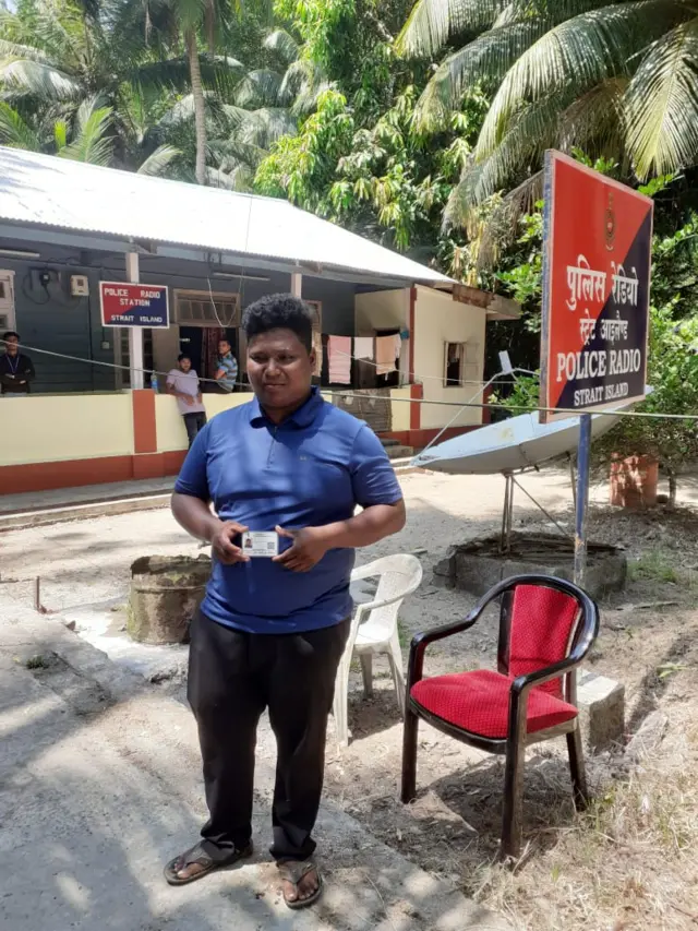 A man from the Great Andamanese Tribe of Strait Island in South Andaman outside the polling booth