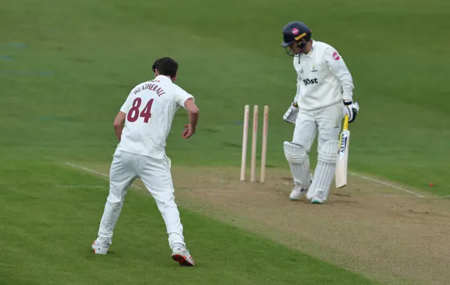 Raphael Weatherall bowls Kiran Carlson