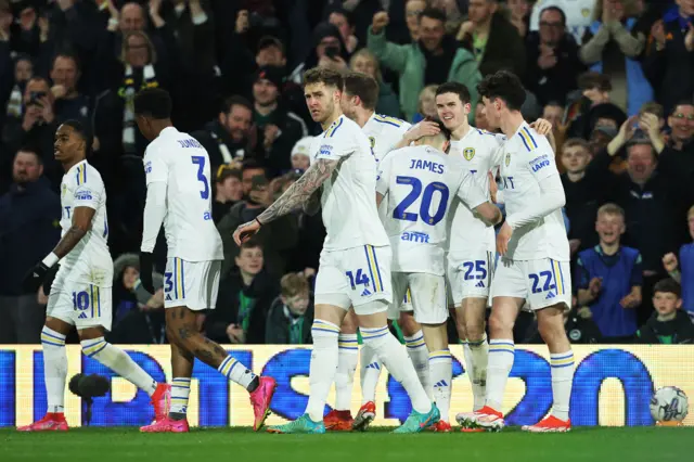 Leeds players celebrate scoring a goal