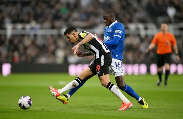 Doucoure tackles Guimaraes in midfield