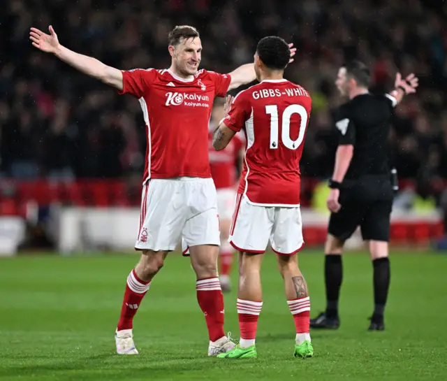 Wood and Gibbs-White celebrate Forest's second goal