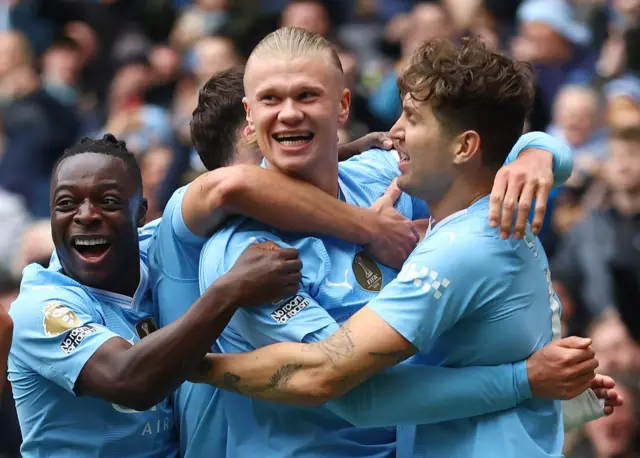 Erling Haaland celebrates scoring for Manchester City against Everton