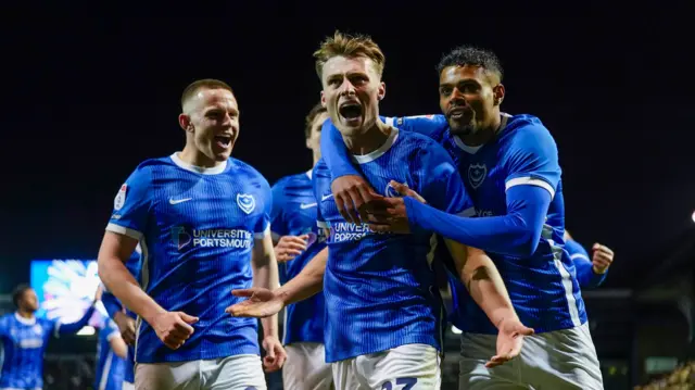 Portsmouth celebrate Owen Moxon's equaliser against Wrexham