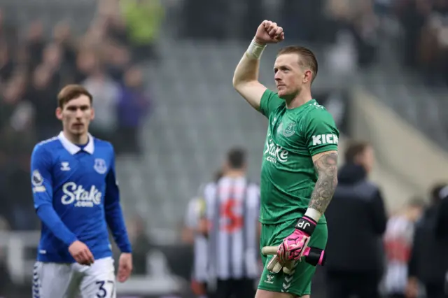 Pickford fist pumps towards the away fans