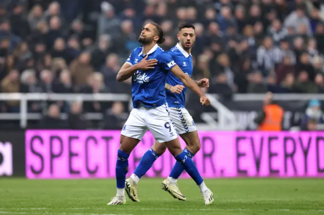 Calvert-Lewin celebrates his goal with a chest pump