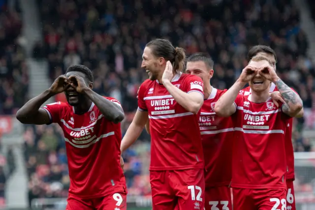 Middlesbrough players celebrate scoring a goal