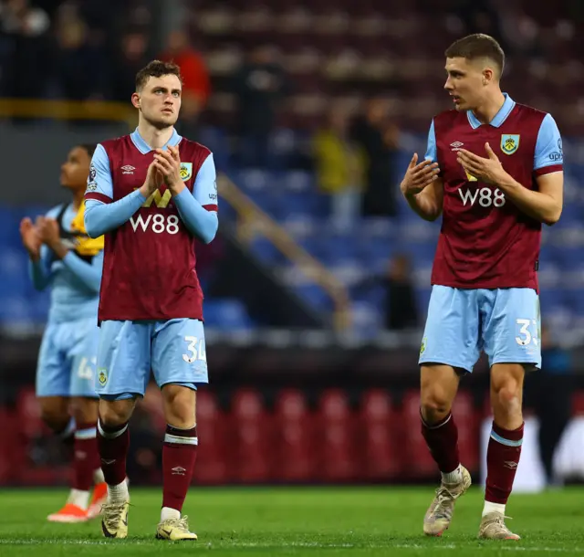 Burnley players clap the fans at FT