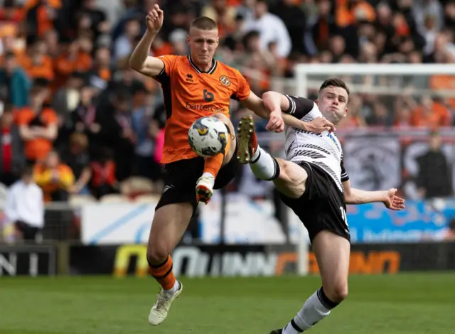 Dundee United's Sam McClelland and Ayr United's Jamie Murphy