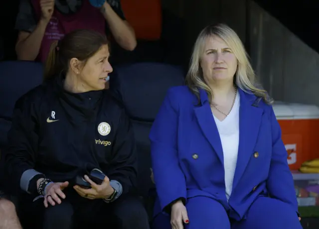 Emma Hayes sits in the dugout