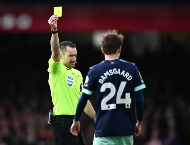 Damsgaard is shown a yellow card