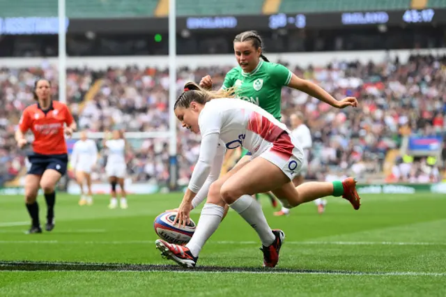 Jess Breach of England scores her team's seventh try