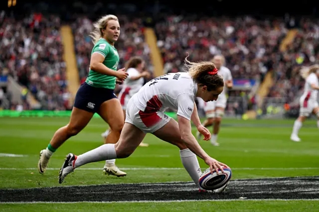 Abby Dow of England scores