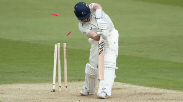 Ethan Bamber is bowled at Lord's