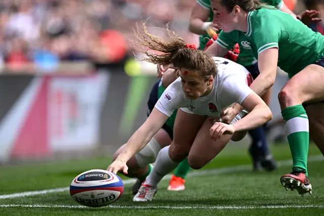 Abby Dow of England drops the ball whilst attempting to score