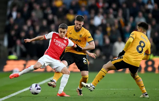 Leandro Trossard, Matt Doherty and Joao Gomes