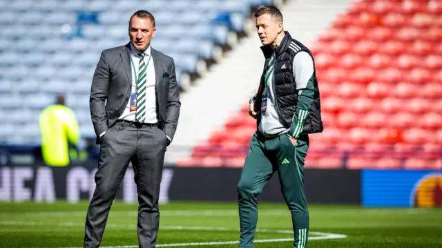 Brendan Rodgers and Callum McGregor inspect the Hampden pitch