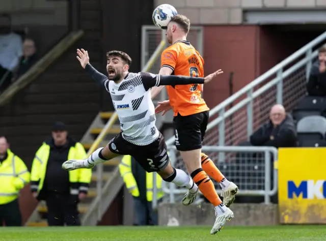 Ayr United's Nick McAllister and Dundee United's Louis Moult