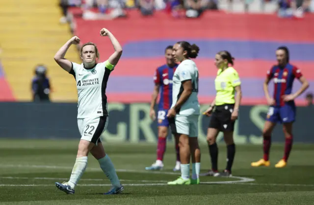 Cuthbert pumps her arms towards the away fans after her goal