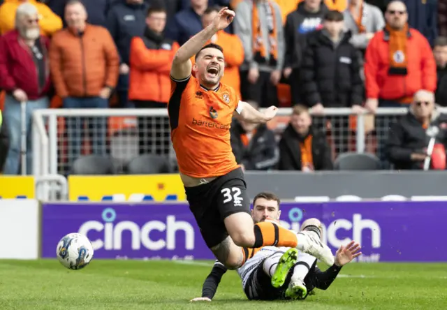 Dundee United forward Tony Watt is fouled