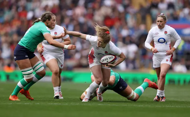 Abby Dow of England carries the ball