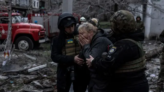 A woman cries while searching for a baby in a civilian building after shelling amid Russia-Ukraine war in Sloviansk, Donetsk Oblast, Ukraine on April 14, 2023