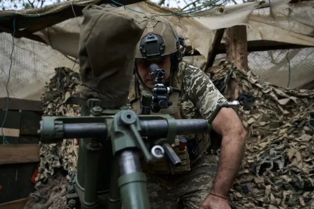 Ukrainian soldiers from the assault brigade inflict fire damage with a 120 mm mortar while supporting the assault operations of the infantry on April 19, 2024 in Ukraine