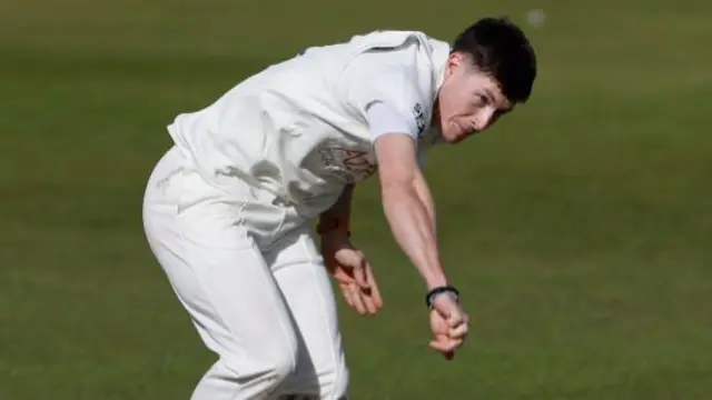 Matthew Potts bowling for Durham