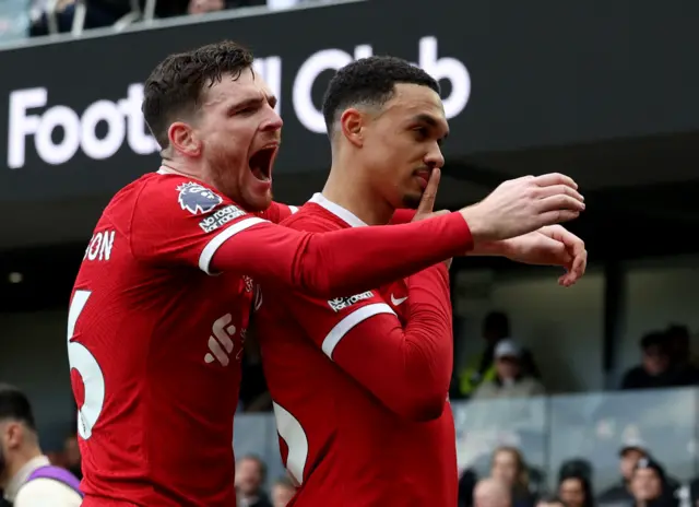 Andy Robertson hugs Trent Alexander-Arnold after his goal against Fulham