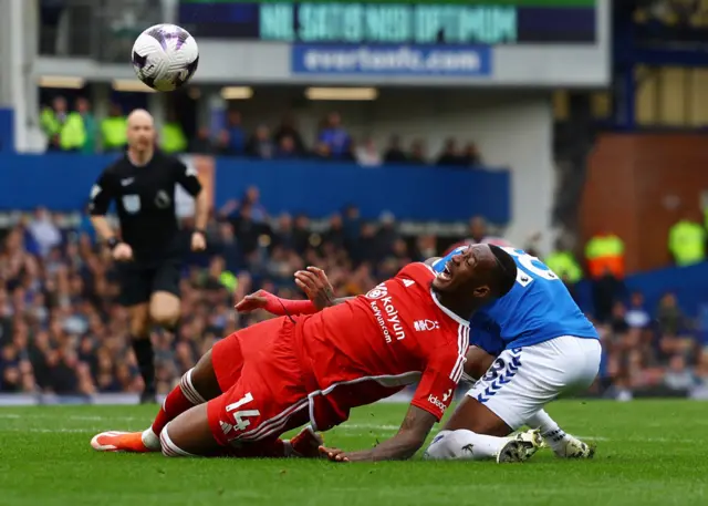 Callum Hudson-Odoi in action with Everton's Ashley Young